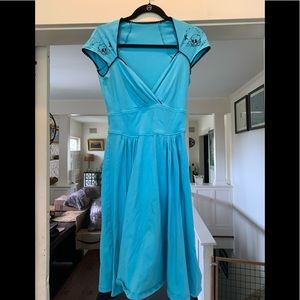 AS IS please read. Blue  skull dress with blown side seem
